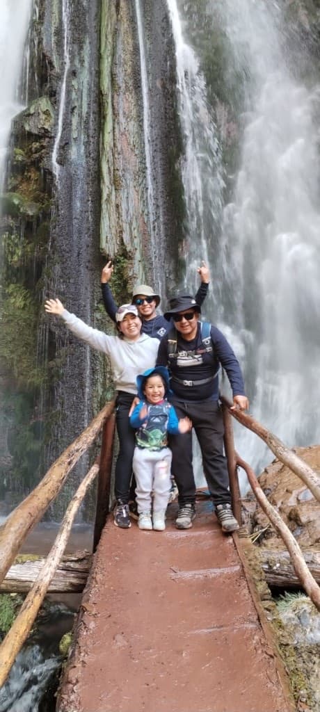 Ghevans Travel Peru family at a waterfall in Peru